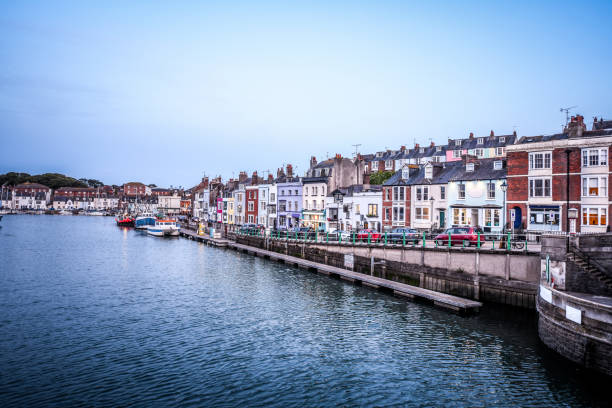 istock Cars Parked On Weymouth Pier, UK 1296371665