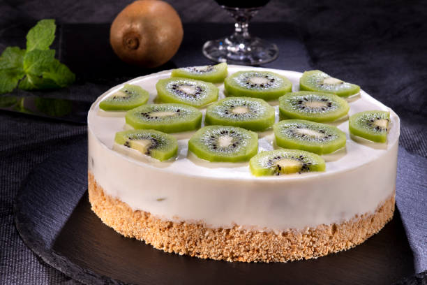istock Decorated cheesecake with kiwi 1296373038