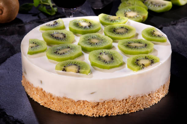 istock Decorated cheesecake with kiwi 1296373073