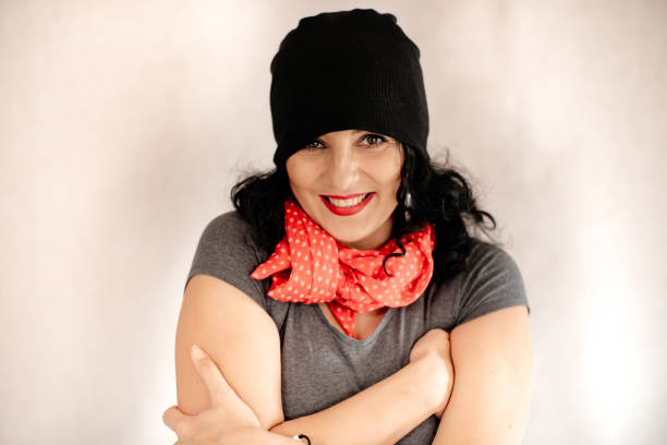 istock Woman in a gray coat on a white background. 1296373317