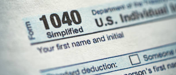 Super close up blurred view of "nForm 1040, U.S. Individual Income Tax Return. Banner photo stock photo