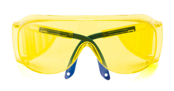 istock yellow safety glasses isolated on white background 1296374323