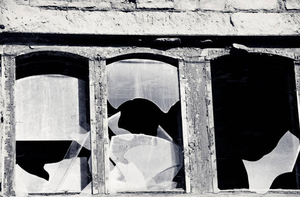 Old broken window in abandoned building