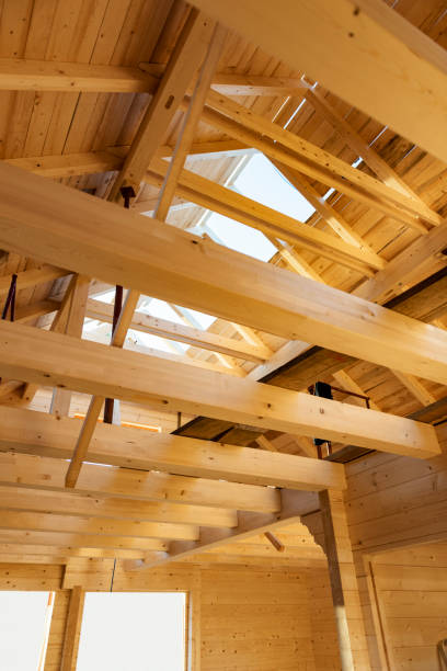 istock Wooden house on construction site 1296374620