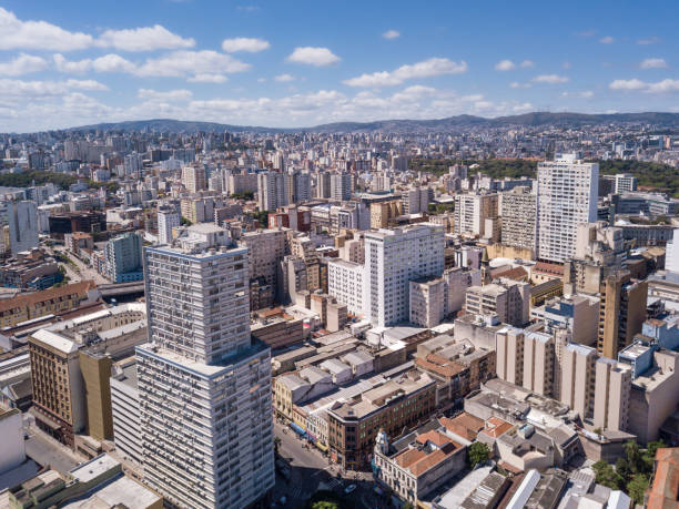 Drone aerial view of buildings skyline of Porto Alegre city, Rio Grande do Sul state, Brazil. Beautiful sunny summer day with blue sky. Drone aerial view of buildings skyline of Porto Alegre city, Rio Grande do Sul state, Brazil. Beautiful sunny summer day with blue sky. Concept of urban, architecture, cityscape, landmark, downtown. porto alegre stock pictures, royalty-free photos & images