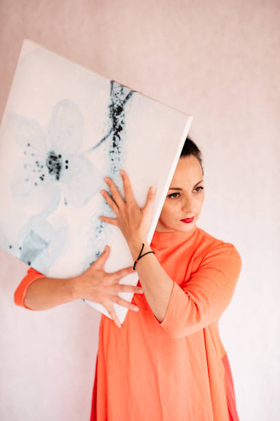 istock The woman holds the karina with both hands. 1296375778