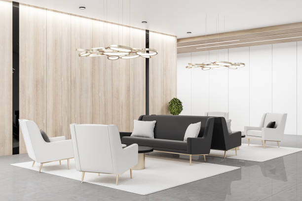 istock Comfortable waiting area with chairs and wooden wall. 1296376051