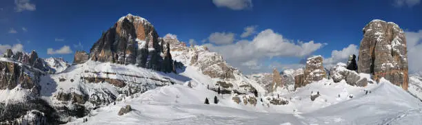 winter landscape in the Cortina d'Ampezzo Dolomites. Tofana di Rozes mountain group and the Cinque Torri (five towers group). Veneto, Italy.