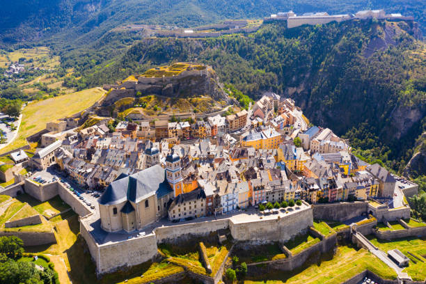 Fortified township of Briancon, France Picturesque autumn landscape with imposing medieval citadel in fortified township of Briancon in Hautes-Alpes department, France hautes alpes photos stock pictures, royalty-free photos & images