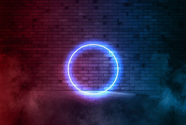 istock Neon circle on the brick wall on smoke. Bright banner advertising with  copy space. 1296384040