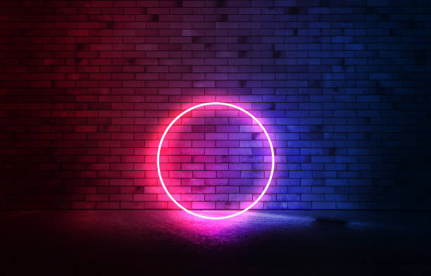 istock Pink neon circle on the brick wall on smoke. Bright banner advertising with  copy space. 1296384050