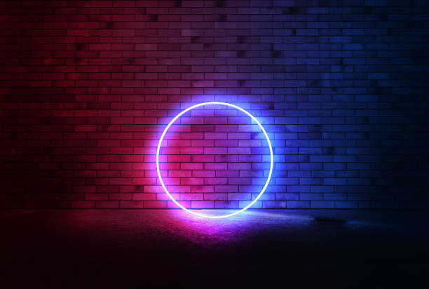 istock Blue neon circle on the brick wall with reflection.  Copy space banner. 1296384084