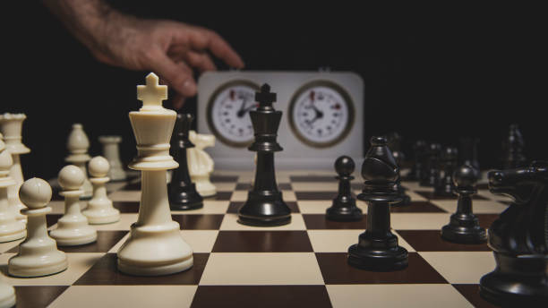 Chess game - tournament time Adult man playing chess on a tournament championships stock pictures, royalty-free photos & images