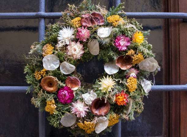 istock Door wreath with many strawflower blooms 1296390137