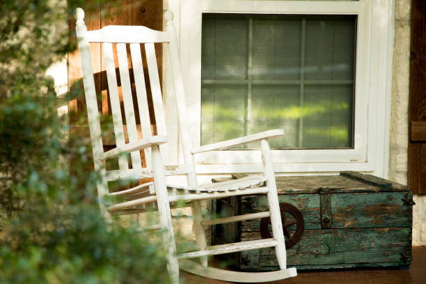 istock Empty white wood rocking chair. 1296391620