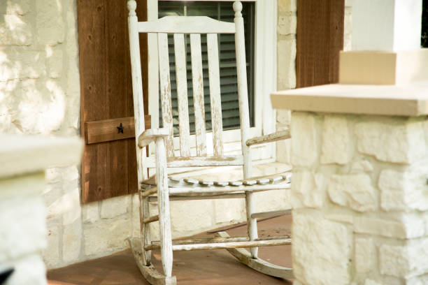 istock Empty white wood rocking chair. 1296391625