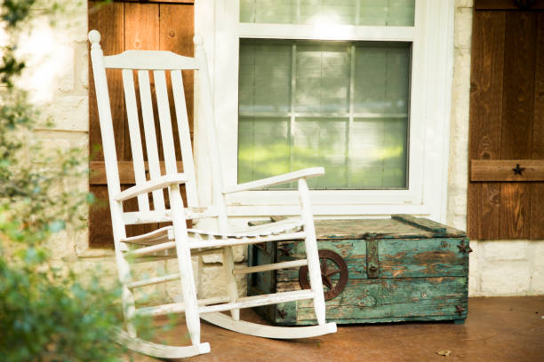 istock Empty white wood rocking chair. 1296391633