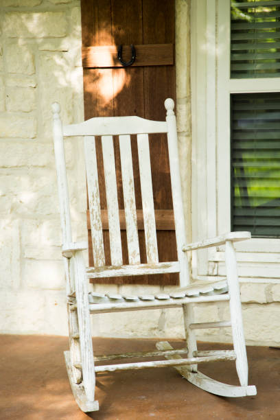 istock Empty white wood rocking chair. 1296391677