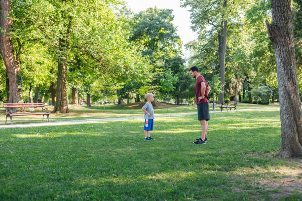 father and son fitness - healthy lifestyle nature sports shoe childhood imagens e fotografias de stock