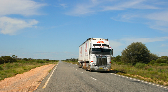 Benambra, Australia - March 12, 2012: Road Train, Australian truck with trailer in rural countryside through remote town in Victoria