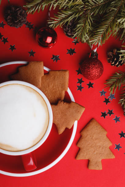 istock cup of coffee and gingerbread and Christmas decorations