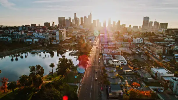 Aerial shot of Los Angeles from over MacArthur Park at sunrise.
