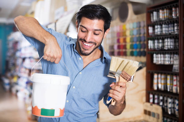 istock Male buyer in paint store 1296393791