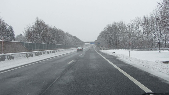 driving on a highway or freeway in winter, road traffic and transportation