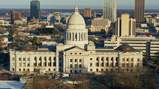 Drone shot of the Arkansas State Capitol Building on a sunny winter day in Little Rock.