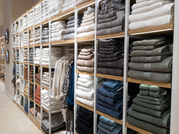 istock Shelves of bed clothe and bath towels 1296401697