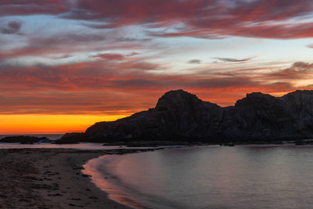 istock Colourful High Cloud Sunrise Seascape and Rock Formations 1296403408