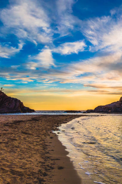 istock Colourful High Cloud Sunrise Seascape and Rock Formations 1296403410