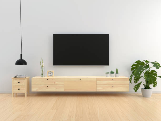 istock Widescreen TV and sideboard in living room, 3D rendering 1296403462