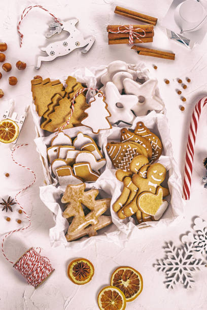 istock Top view of unpacked christmas present with sweets. Christmas celebration concept 1296403650
