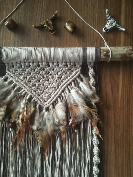 istock Macrame wall hanging handmade with feathers photo 1296405550