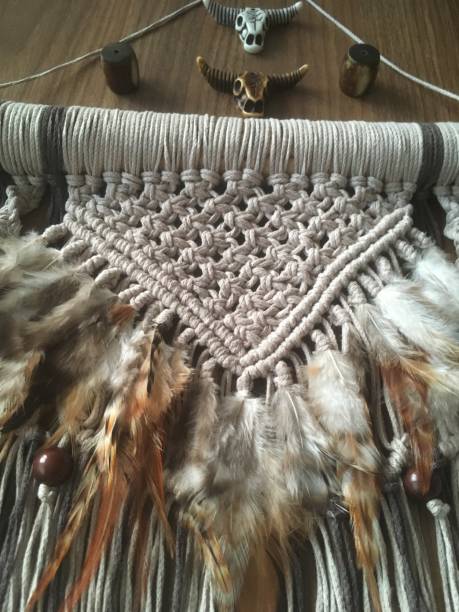 istock Macrame wall hanging handmade with feathers photo 1296405563