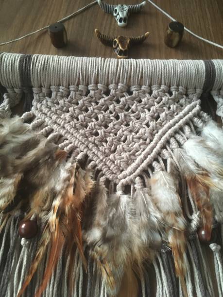 istock Macrame wall hanging handmade with feathers photo 1296406492