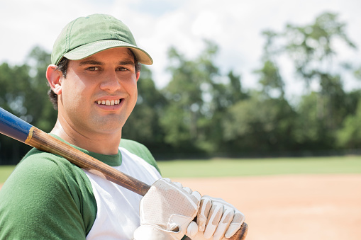 Spring and summer baseball season is here.  Player getting ready for his turn to bat.