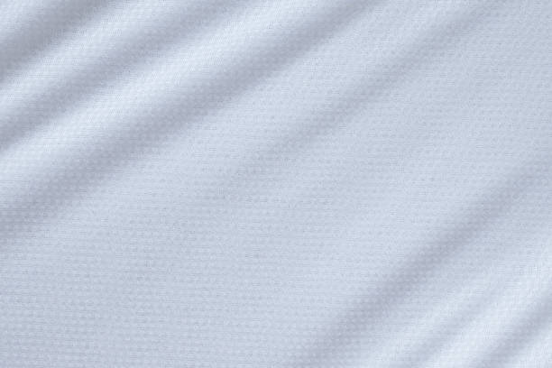เสื้อผ้ากีฬาสีขาวผ้าเสื้อฟุตบอลพื้นหลังพื้นผิว - baseball uniform ภาพสต็อก ภาพถ่ายและรูปภาพปลอดค่าลิขสิทธิ์