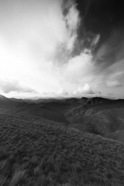 istock Autumn mountains and sky with clouds 1296408859