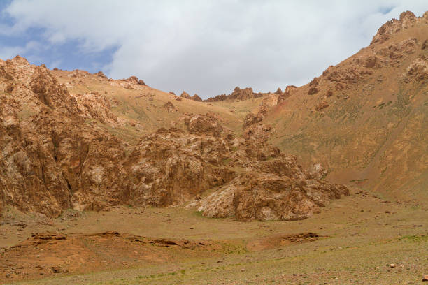 istock Along Great Pamir Highway, desolated mountaneous landscape 1296410537