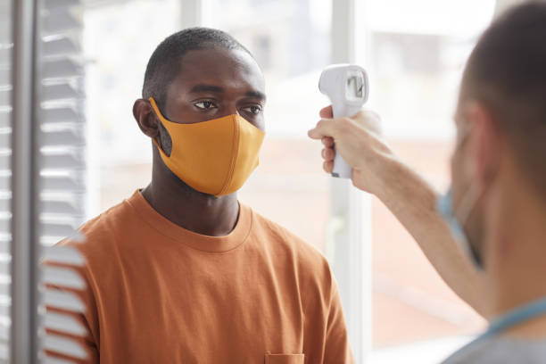 istock African-American Man at Covid Safety Checkup 1296415700