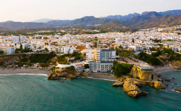 istock View from drone of coastal Mediterranean town of Nerja, Spain 1296415744