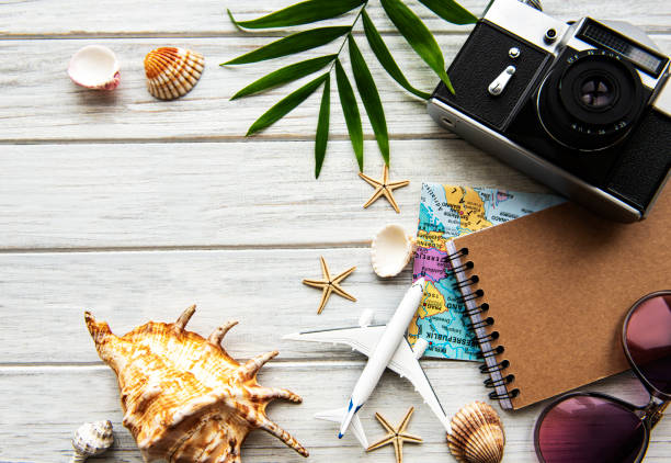 istock Traveler accessories on wooden  background 1296416821