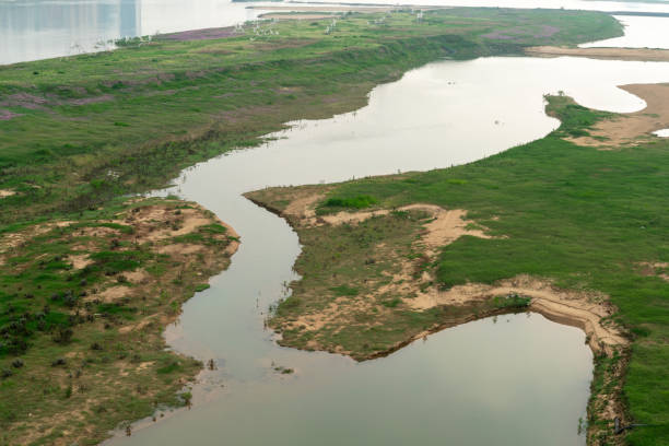 istock River and green grass in rainy weather 1296420395