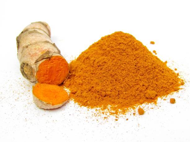istock Turmeric root and powder isolated on white background 1296423021