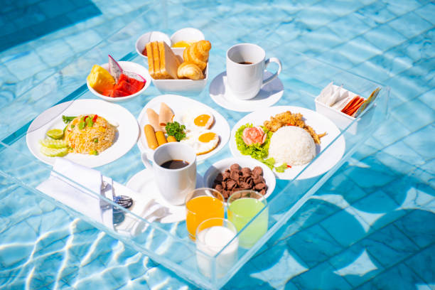 istock luxury floating breakfast eat in swimming pool 1296423994