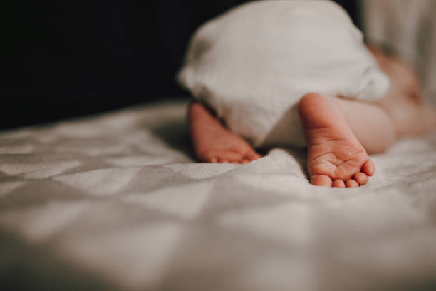istock Tired newborn baby 1296424219