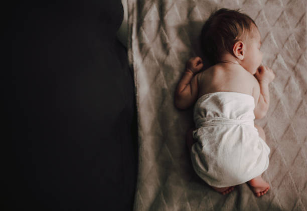 istock Tired newborn baby 1296424785