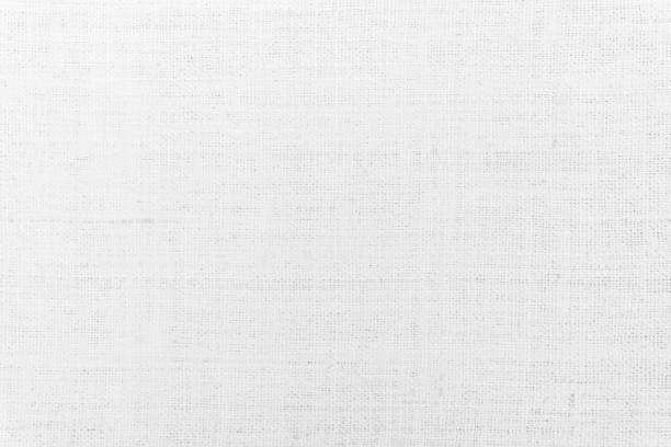 istock White Hemp rope texture background. Haircloth or blanket wale cloth wallpaper. Rustic sackcloth canvas fabric texture in natural. Natural vintage linen burlap weaving, Old cotton carpet background. 1296432067